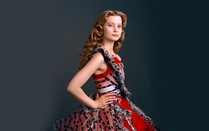 Mia Wasikowska pose for a photo.